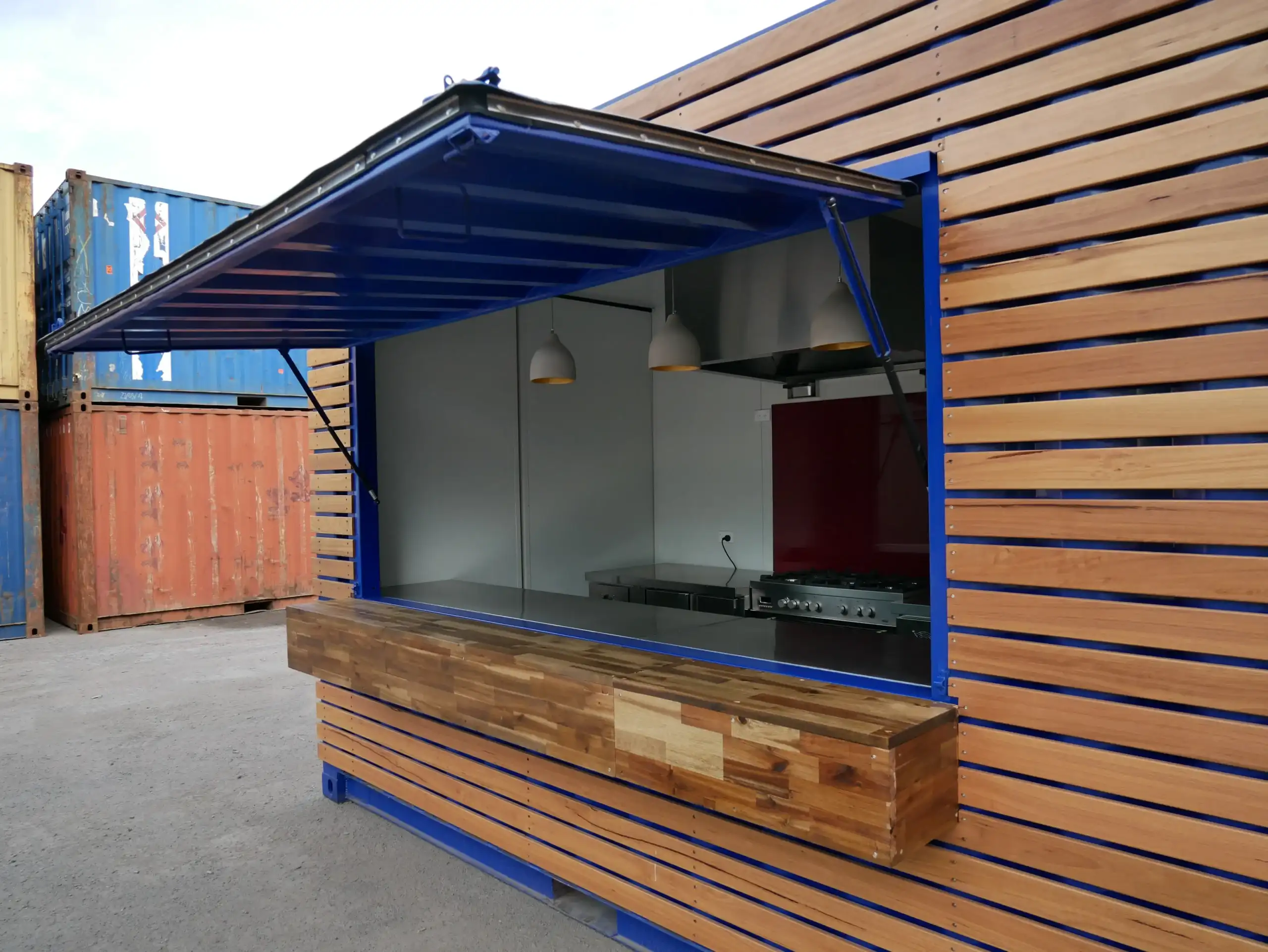 Desain Cafe Outdoor Instagramable pada Container Cafe with Timber Facade 2