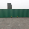 Shipping container 40' high cube warna hijau view samping.
