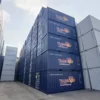 Tumpukan 20' container RAL 5013 general purpose warna biru cobalt view samping foto dari bawah.